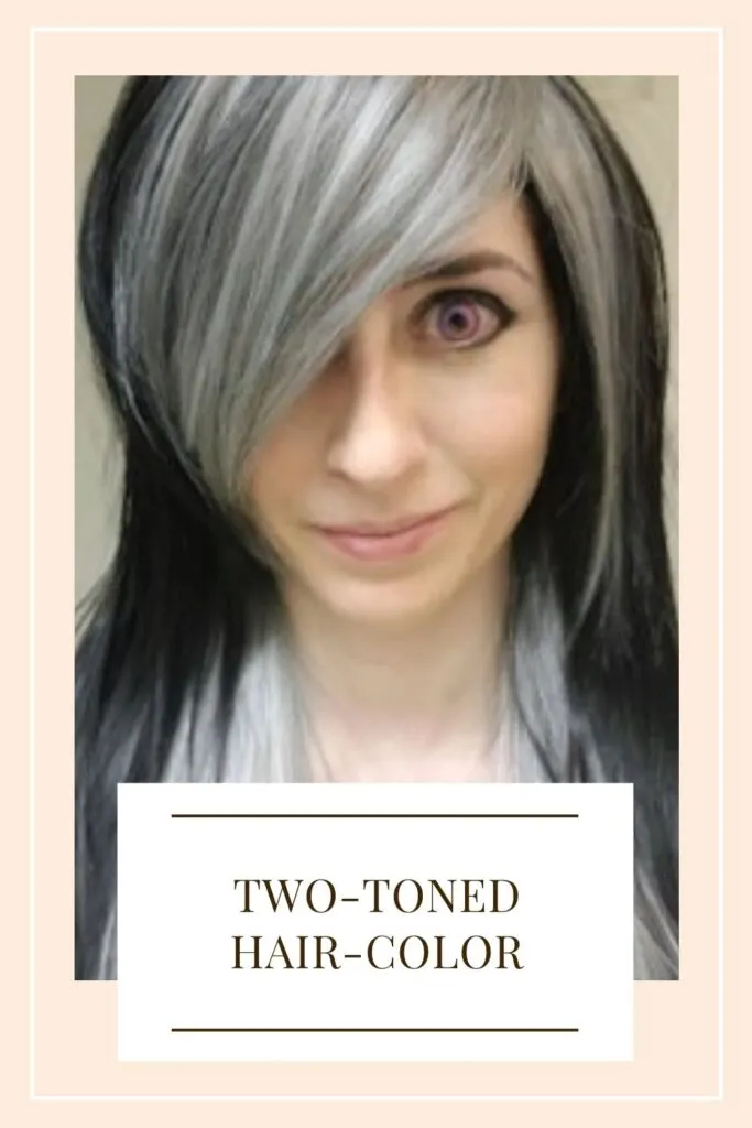 A smiling beautiful lady is showing her black and blonde Two-Toned Hair-Color - hair color for women