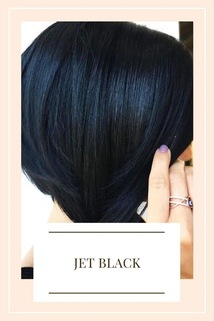 A women in short hair showing her Jet Black hair color - hair color highlights