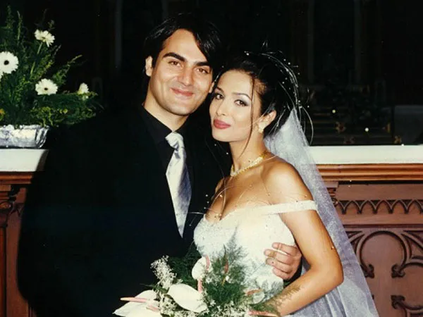 Arbaaz Khan and Malaika Arora smiling and posing in their wedding outfit Arbaaz Khan and Malaika Arora smiling and posing in their wedding outfit - bollywood divorce 2021