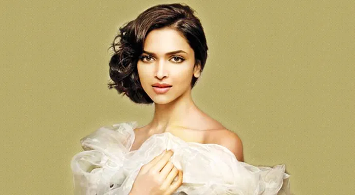 Deepika Padukone in off-shoulder light pink dress with side bun Deepika Padukone in off-shoulder light pink dress with side bun - Deepika padukone bun hairstyles