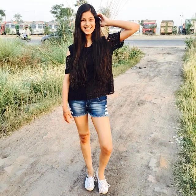 Harnaaz Sandhu in black top and blue denim shorts Harnaaz Sandhu in black top and blue denim shorts - Harnaaz Sandhu no makeup photos