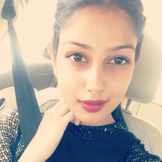 Harnaaz Sandhu in black top posing for camera Harnaaz Sandhu in black top posing for camera - Harnaaz Sandhu no makeup photos