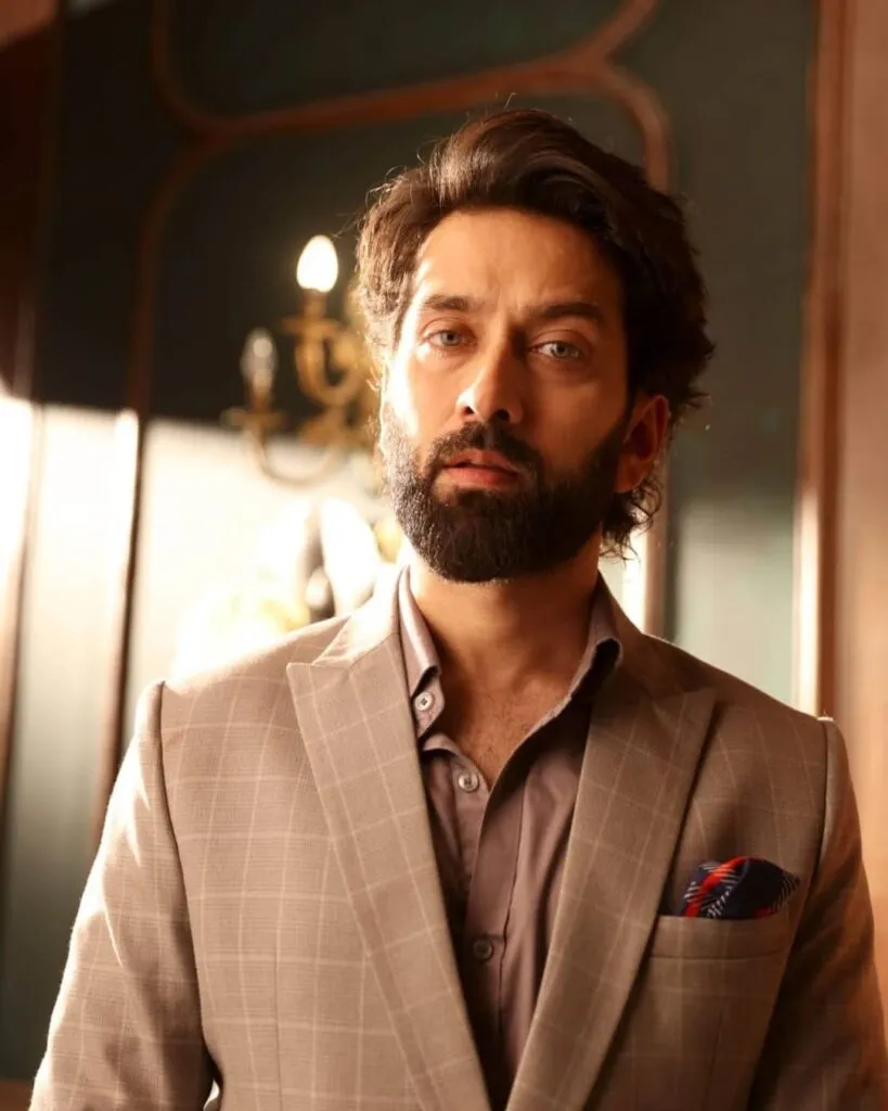 Nakuul Mehta wearing suit and posing for camera Nakuul Mehta wearing suit and posing for camera - most handsome tv actors indian 2021