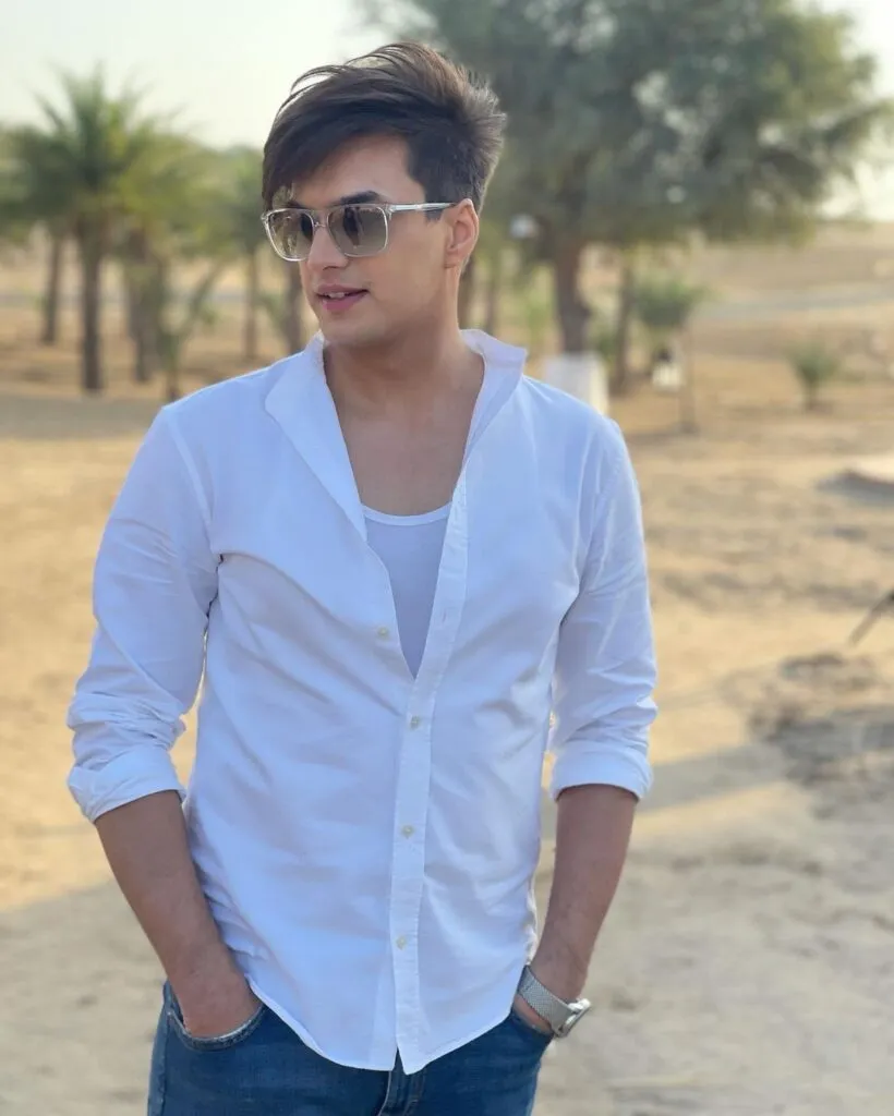 Mohsin Khan wearing white shirt and goggles giving a side pose to camera Mohsin Khan wearing white shirt and goggles giving a side pose to camera - most handsome actors all the time