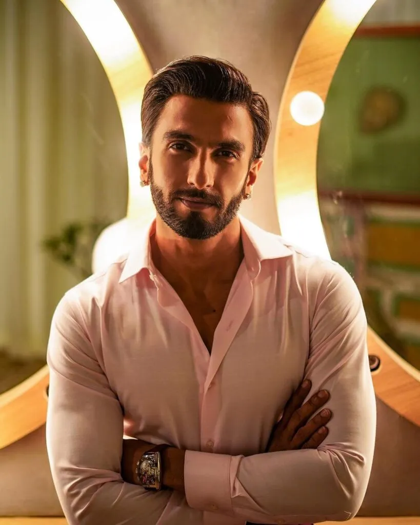 smiling Ranveer Singh posing in pink shirt smiling Ranveer Singh posing in pink shirt - bollywood handsome actors