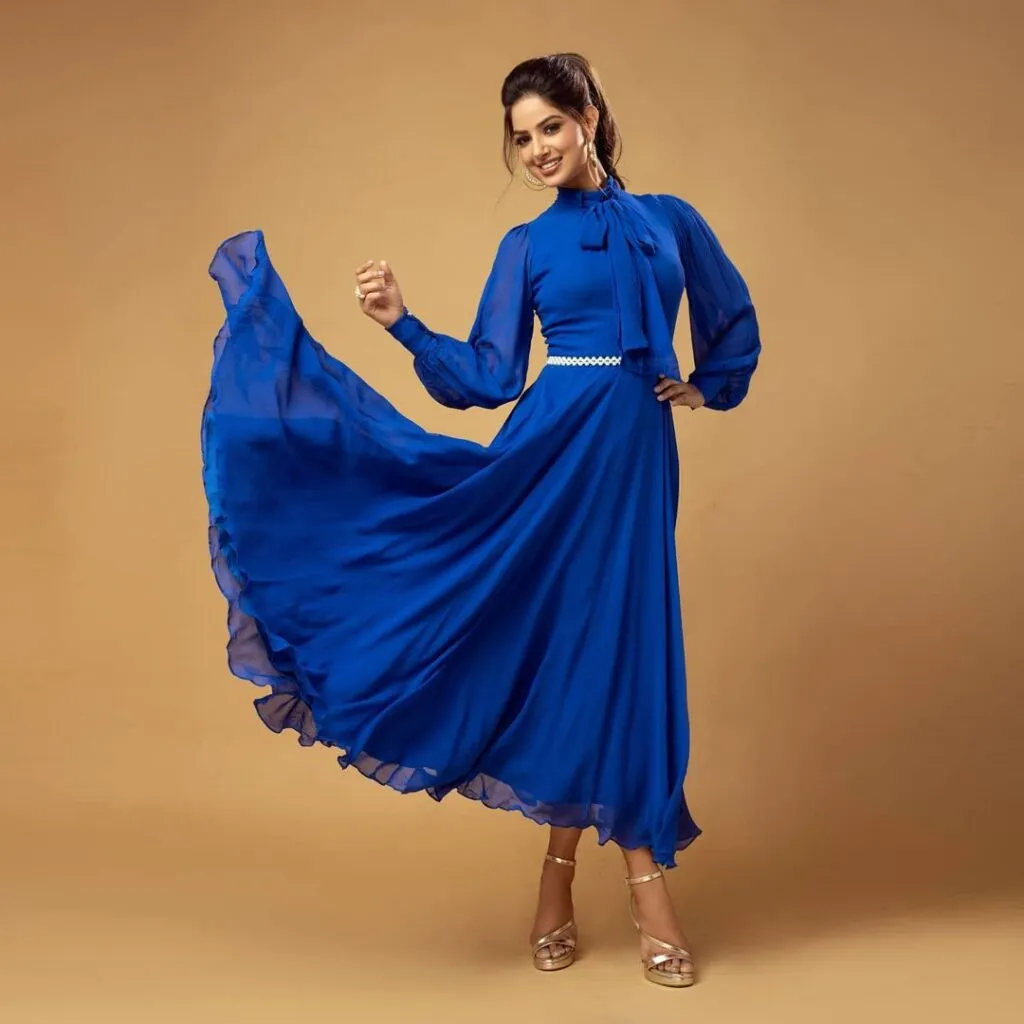 Harnaaz Sandhu in Blue dress smiling and posing for camera Harnaaz Sandhu in Blue dress smiling and posing for camera - Harnaaz Sandhu latest hairstyles