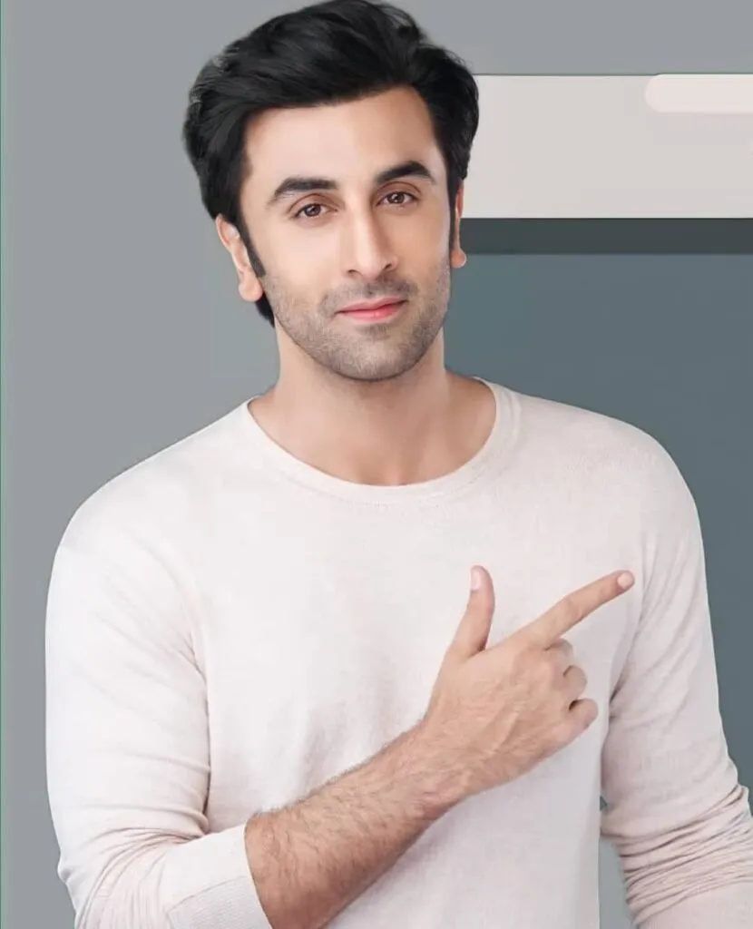 Smiling Ranbir kapoor posing for camera in white t-shirt Smiling Ranbir kapoor posing for camera in white t-shirt - most handsome bollywood actor