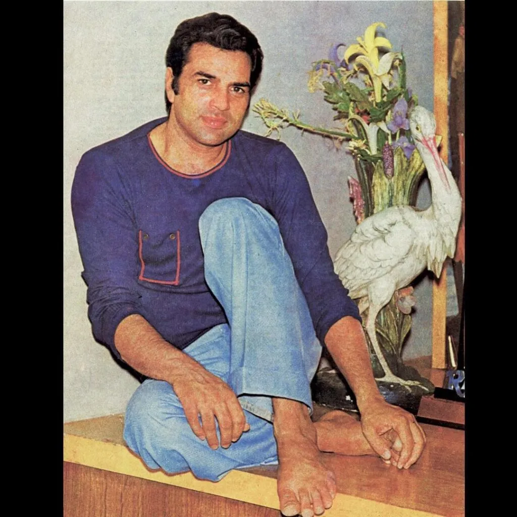 Dhaemendra in Dark blue full sleeves t-shirt and light blue jeans sitting Dhaemendra in Dark blue full sleeves t-shirt and light blue jeans sitting - most handsome man in India 2021