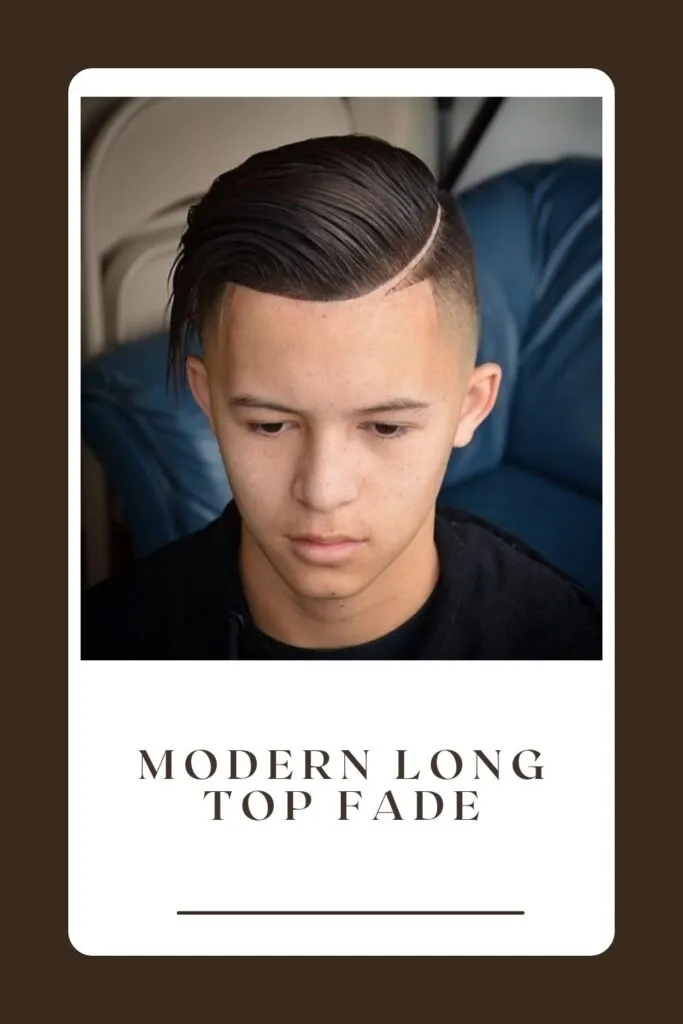 A boy is showing his Modern Long Top Fade - haircuts for school boy
