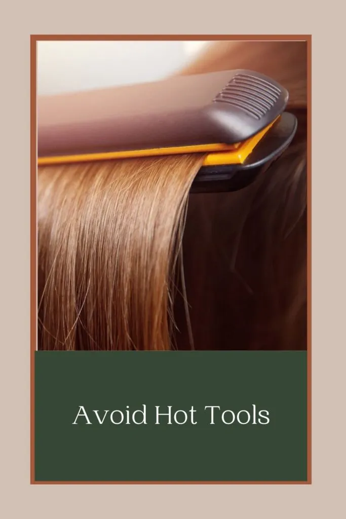 A girl is using hot iron to her brown hair A girl is using hot iron to her brown hair - best hair care routine for hair growth