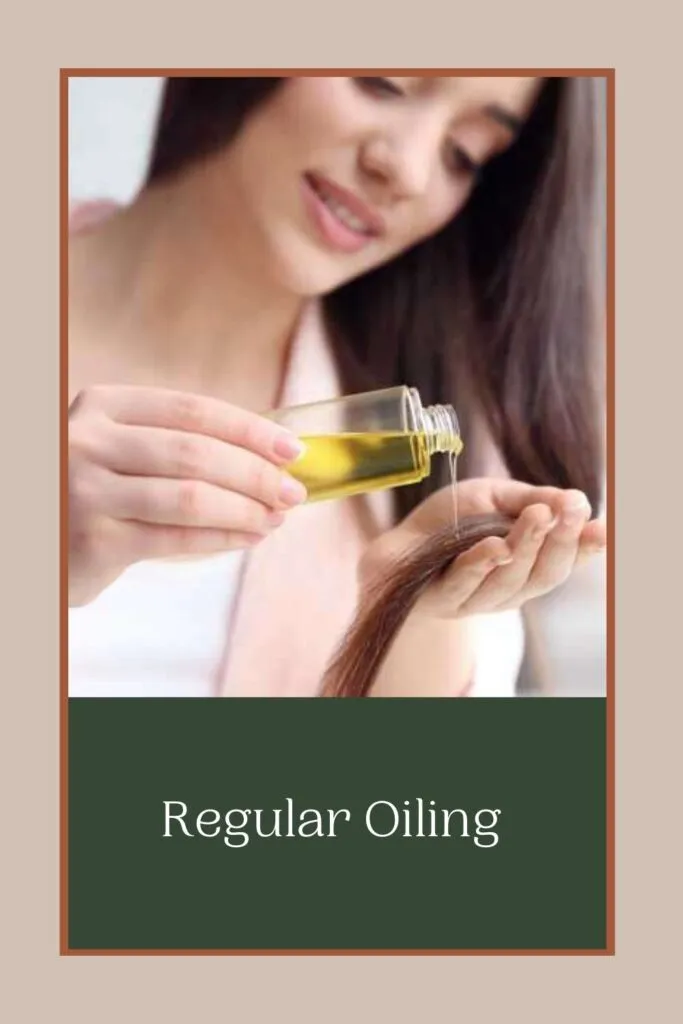 A girl is applying oil to her hair A girl is applying oil to her hair - hair care routine for hair growth