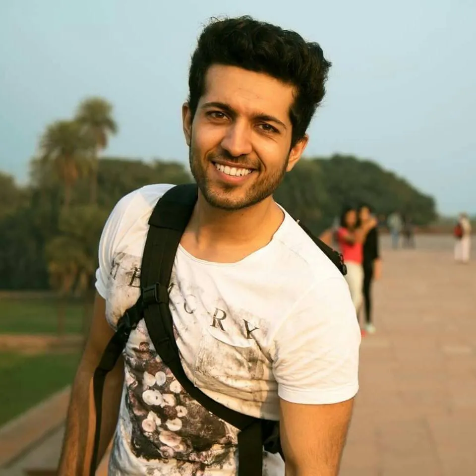 Smiling Saattvic is posing for camera in white t-shirt Smiling Saattvic is posing for camera in white t-shirt - Gay and lesbian celebrities in Bollywood