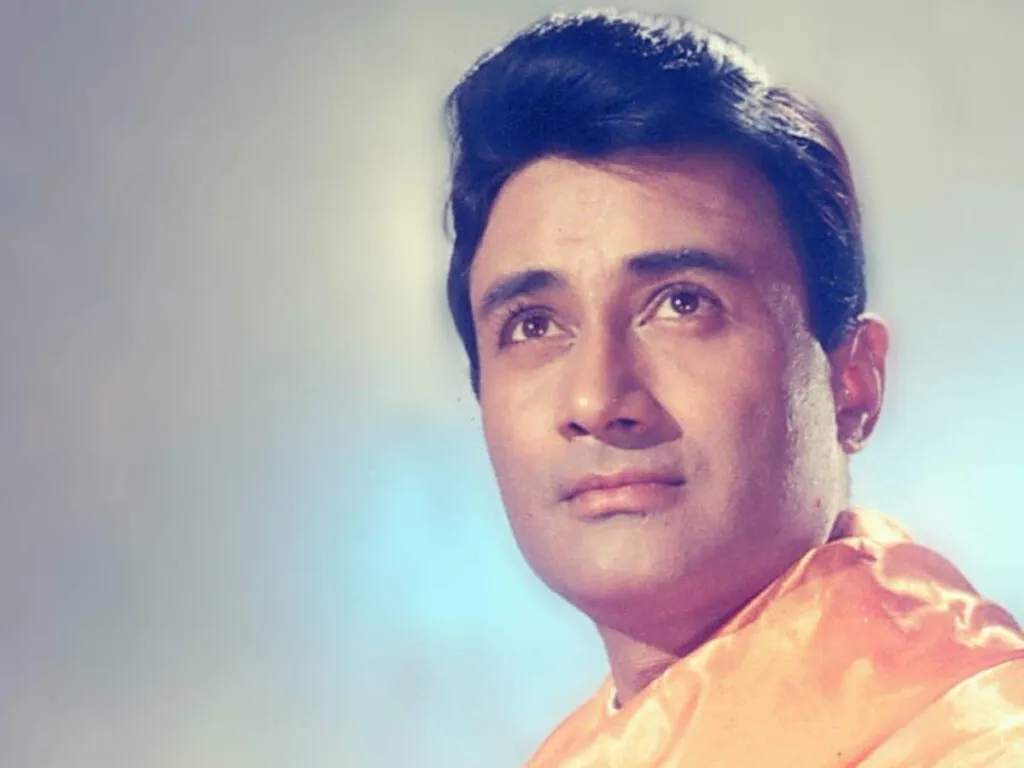 Dev Anand in golden shirt posing for camera Dev Anand in golden shirt posing for camera - all time most handsome actor in India