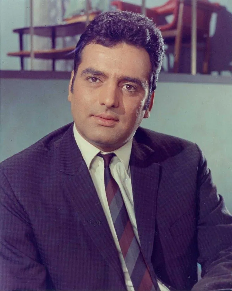Feroz Khan in blur suit posing for camera Feroz Khan in blur suit posing for camera - handsome bollywood actors in India