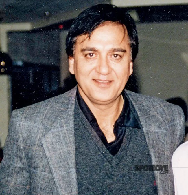 Smiling Sunil Dutt posing for camera in grey suit Smiling Sunil Dutt posing for camera in grey suit - handsome man in India 2021