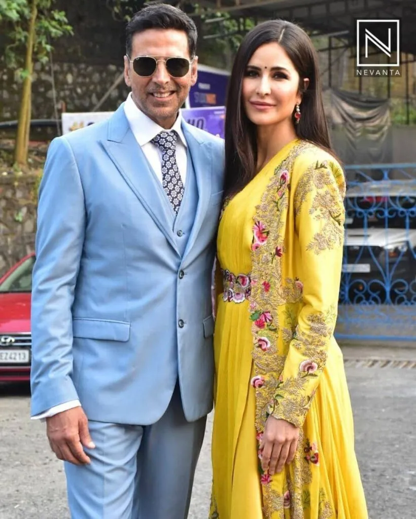 Katrina Kaif in yellow traditional outfit and Akshay Kumar in sky blue suit posing for camera Katrina Kaif in yellow traditional outfit and Akshay Kumar in sky blue suit posing for camera - Katrina Kaif Affairs