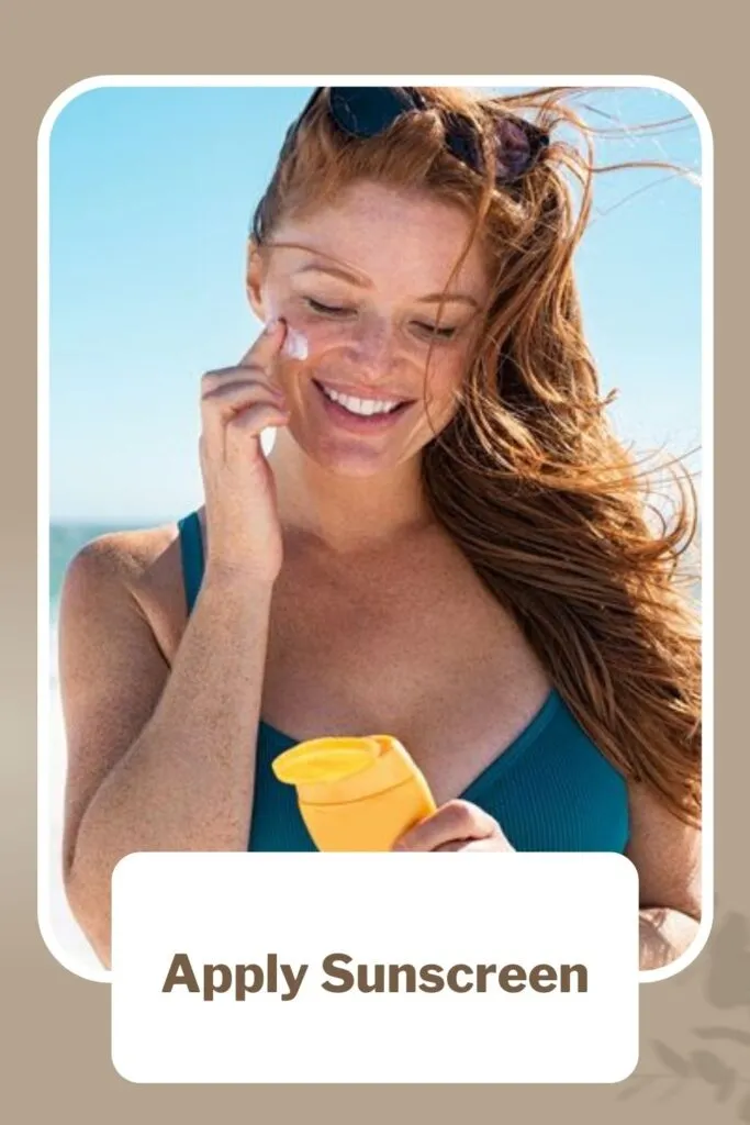 A girl in blue top applying sunscreen on her cheek A girl in blue top applying sunscreen on her cheek - acne prone skin meaning