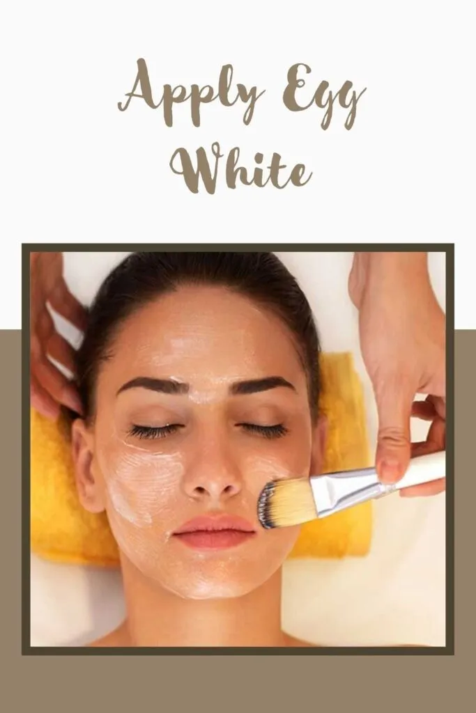 A lady is applying egg white on her face with brush A lady is applying egg white on her face with brush - dark circle home remedies