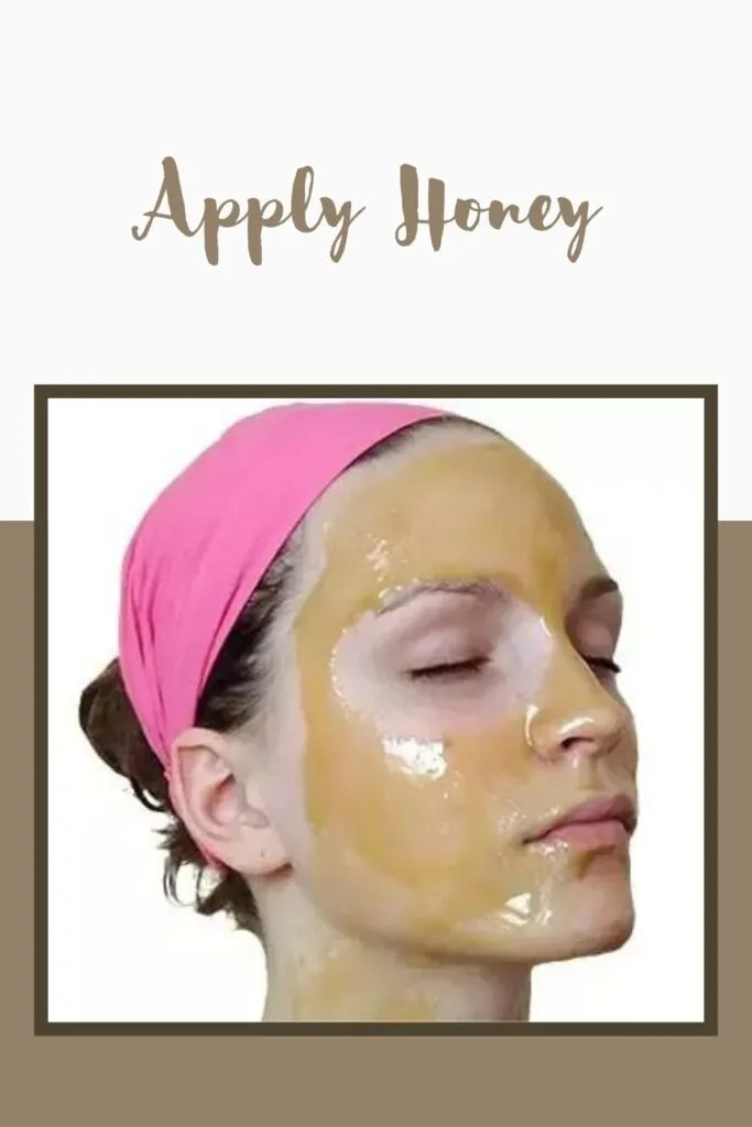 A girl in pink bandana applied honey on her face A girl in pink bandana applied honey on her face - remove Skin Blemishes