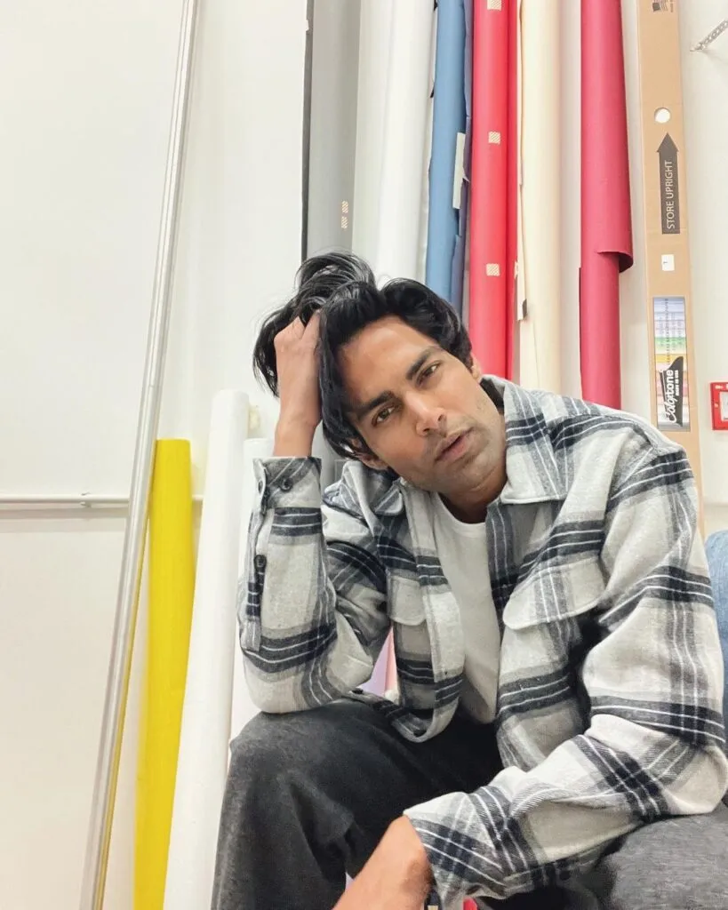 Prabh Uppal in black and white lining jacket posing for camera - models in India