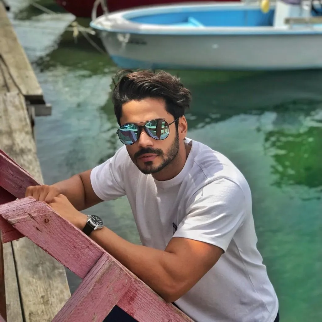 Mudit Malhotra in white t-shirt and goggles posing for camera - male models in India 20200