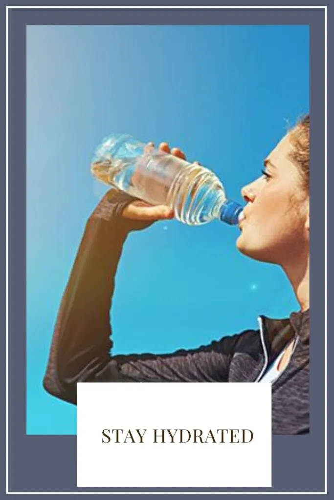 A girl is drinking water with a bottle A girl is drinking water with a bottle - daily skin care routine at home