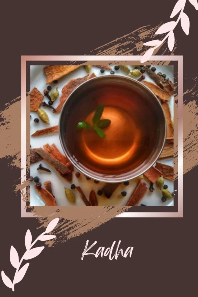 Kadha served in steel bowl with tulsi leaves in it - winter drinks in India