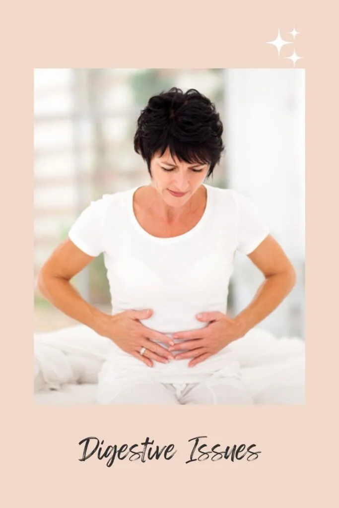 A lady in white t-shirt showing her Digestive Issue A lady in white t-shirt showing her Digestive Issue - soaked almonds water benefits
