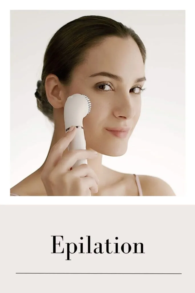 A lady is using a face epilator to remove her facial hair A lady is using a face epilator to remove her facial hair - facial hair in women