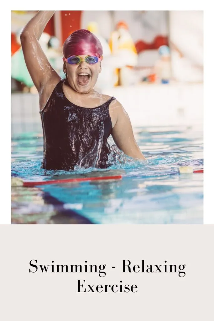 A girl is showing her excitement after swimming A girl is showing her excitement after swimming - swimming