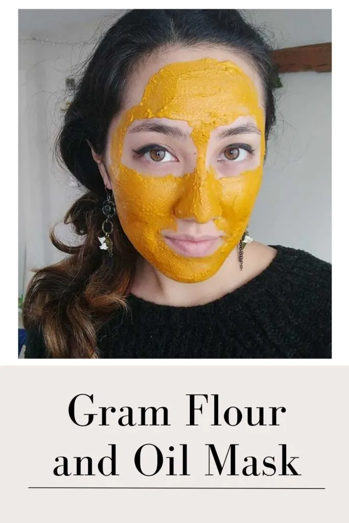 A women in black top applying gram flour and oil face mask A women in black top applying gram flour and oil face mask - oily skin