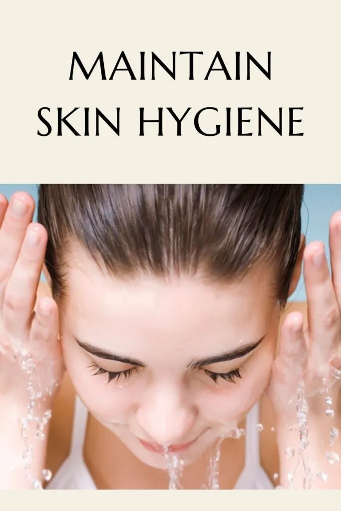 A girl is washing her face with water - remove dark circles