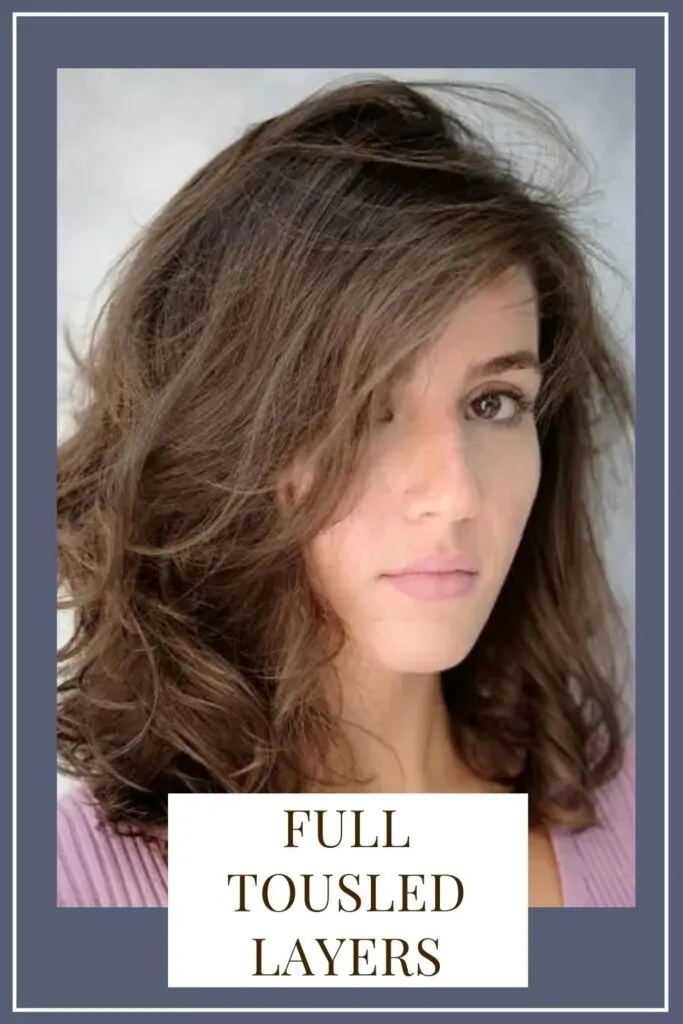 A girl in pink top showing her Full tousled layers hairstyle - Haircut for Oblong face