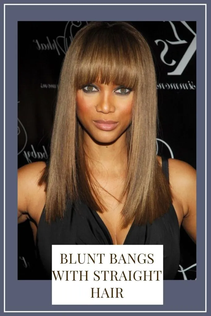 A girl in black deep neck top showing her Blunt bangs with straight hair - face shape