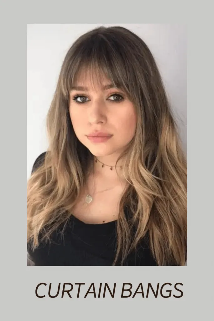 A girl in black round neck top showing her Curtain bangs A girl in black round neck top showing her Curtain bangs - hairstyles for Oval face 2022