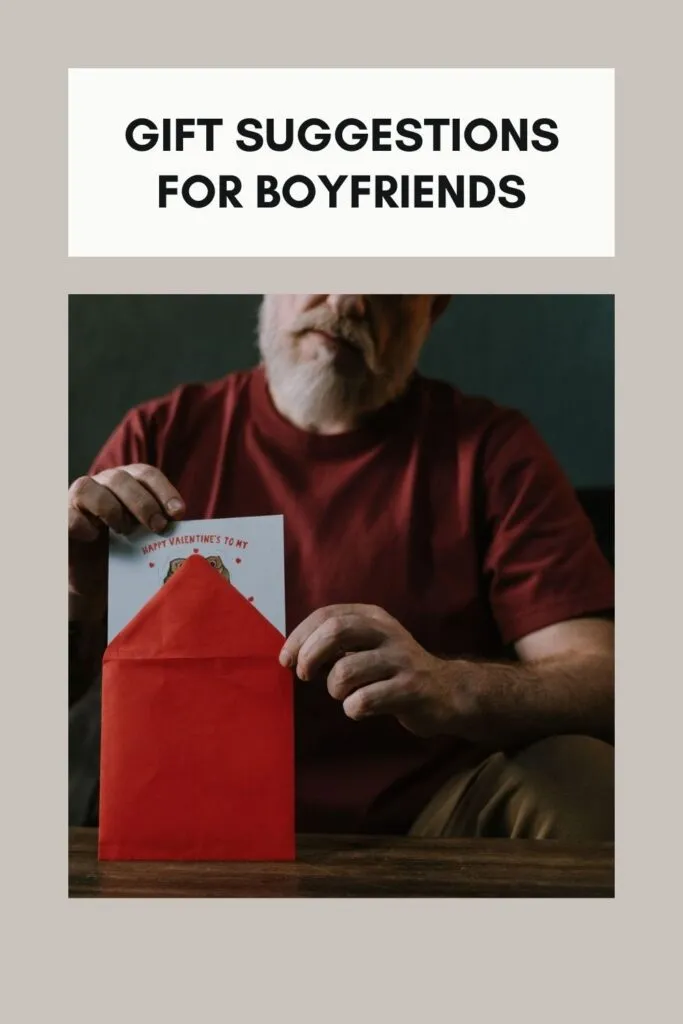 A man is opening his valentine card A man is opening his valentine card - Valentines day gift for your boyfriend