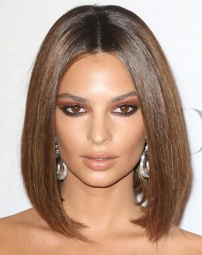 A girl in blonde hair and danglers showing off her Short Blunt Lob hairstyle A girl in blonde hair and danglers showing off her Short Blunt Lob hairstyle - short hairstyle for women