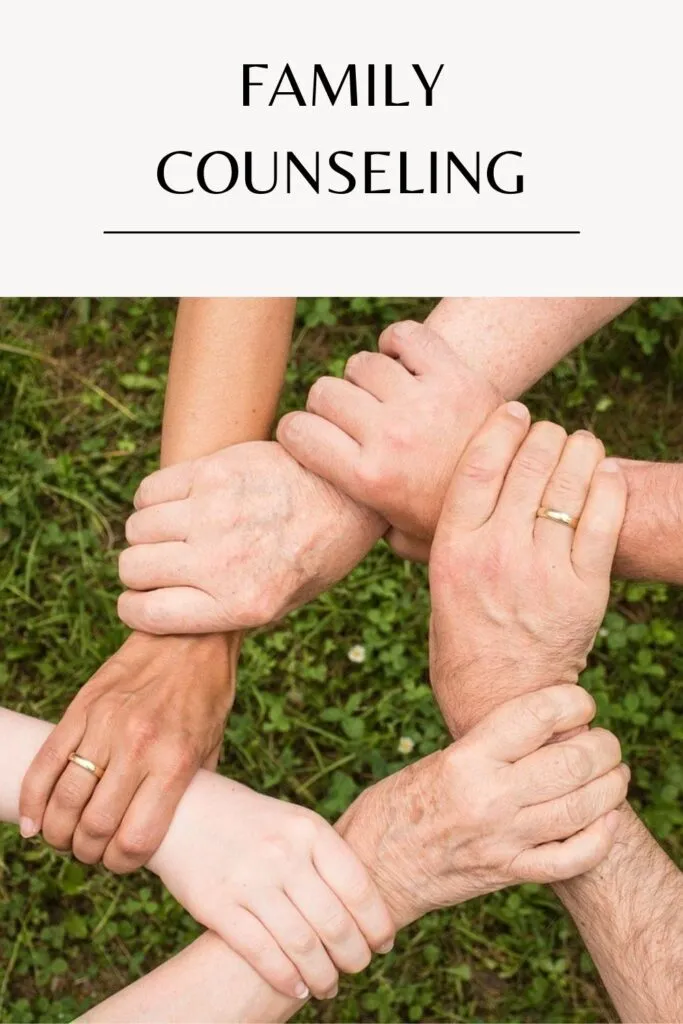A family holding each other's hand A family holding each other's hand - Family Therapy