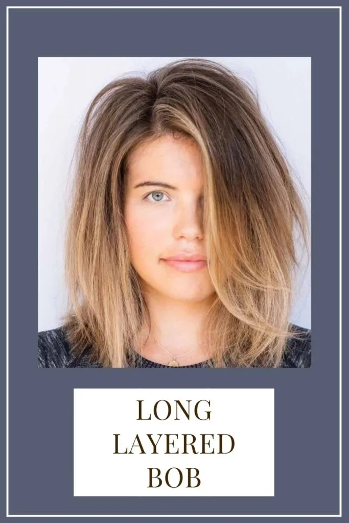 A girl in grey and white top showing her Long layered bob A girl in grey and white top showing her Long layered bob - Heart Face shape