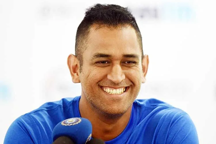 Smiling MS Dhoni in his Mohawk haircut - MS Dhoni latest hairstyle
