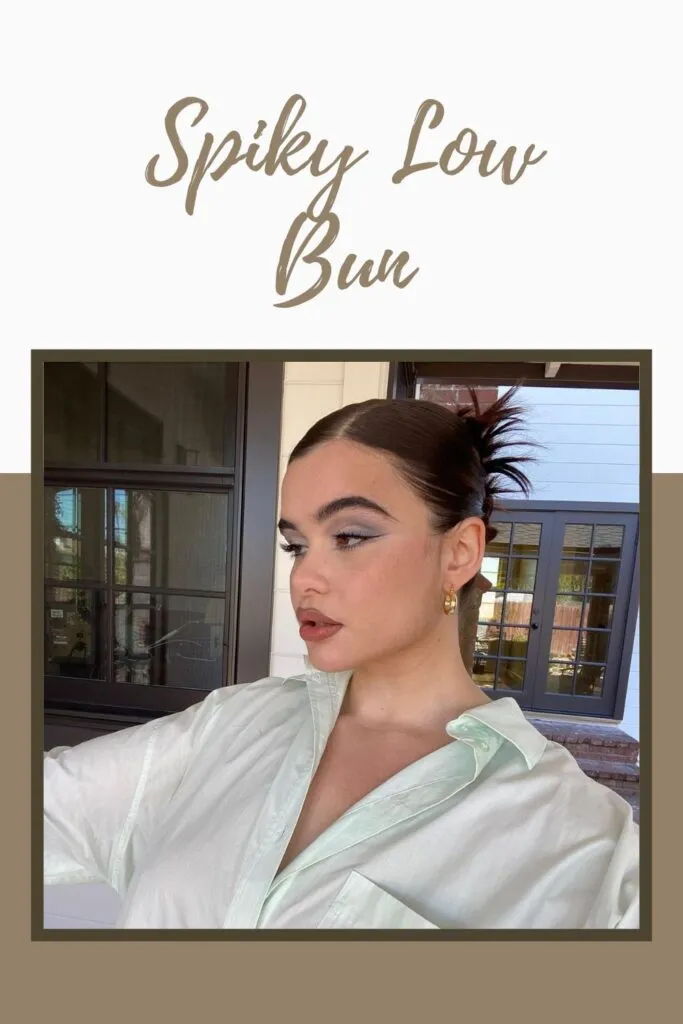 A girl in white front open shirt with bold makeup showing her Spiky Low Bun hairstyle A girl in white front open shirt with bold makeup showing her Spiky Low Bun hairstyle - latest girl's hairstyle