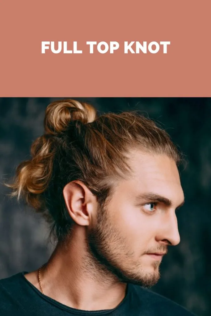 A man in black round neck t-shirt showing the side of his Full Top Knot hairstyle A man in black round neck t-shirt showing the side of his Full Top Knot hairstyle - hairstyles for men long hair