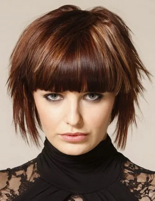 A girl in black net dress showing her Messy Short Bob with Blunt Bangs A girl in black net dress showing her Messy Short Bob with Blunt Bangs - short hair girls of 2022