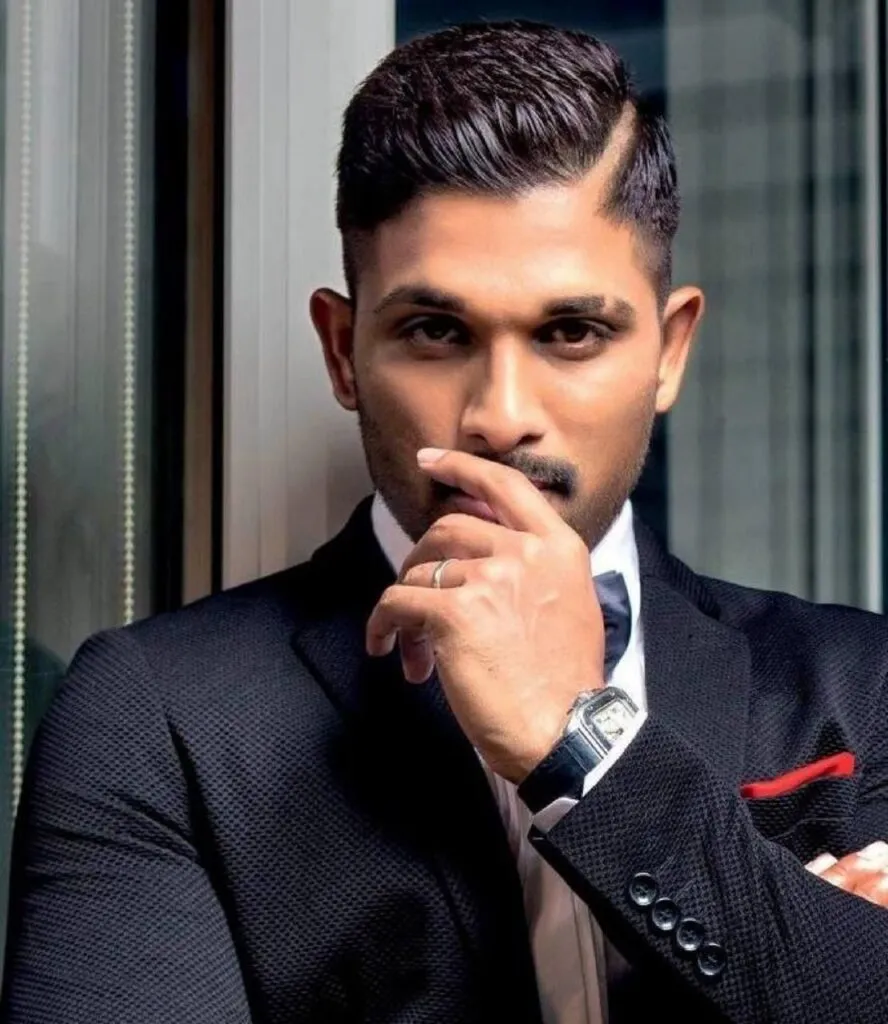 Allu Arjun in black suit with white shirt - Allu Arjun hairstyle Surya