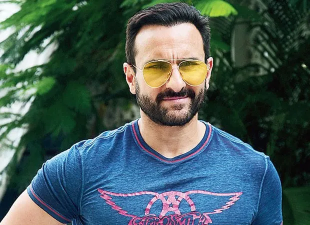 Saif Ali Khan in blue printed t-shirt and goggles posing for camera Saif Ali Khan in blue printed t-shirt and goggles posing for camera - Indian actors hairstyles 2022