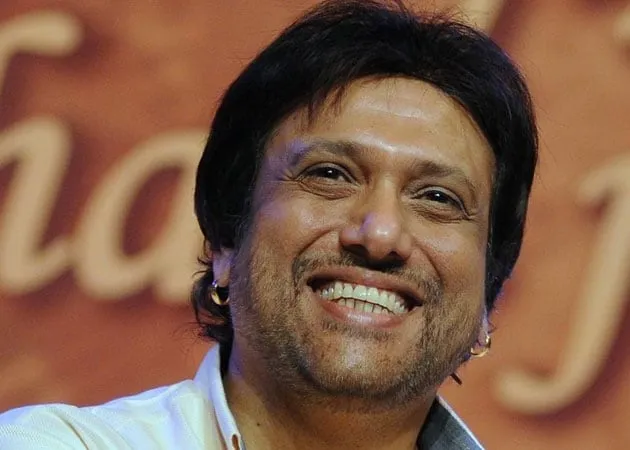 Smiling Govinda in sky blue shirt posing for camera Smiling Govinda in sky blue shirt posing for camera - Tamil actors without makeup