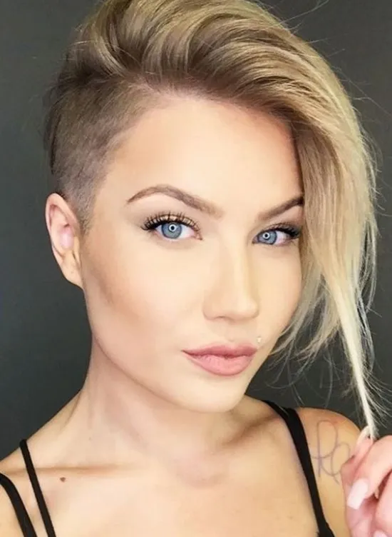 A girl in black strappy dress showing her Side Part Shaved Haircut A girl in black strappy dress showing her Side Part Shaved Haircut - short haircut for teenage girls