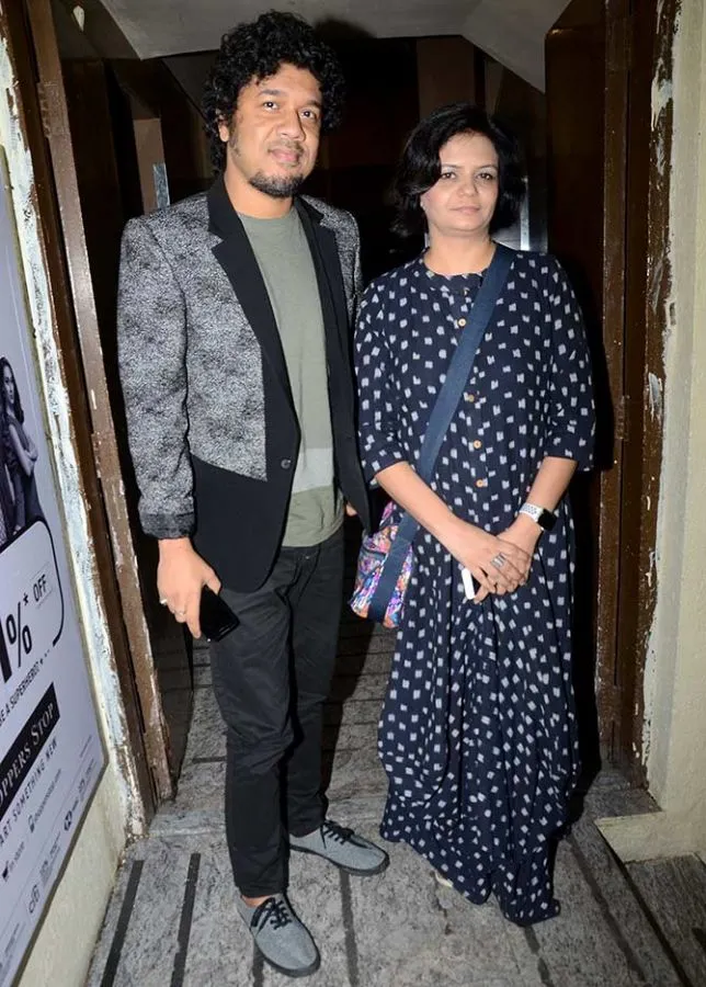 Indian singer Papon with his wife Shweta Mishra Mahanta posing for camera Indian singer Papon with his wife Shweta Mishra Mahanta posing for camera - India singers wife