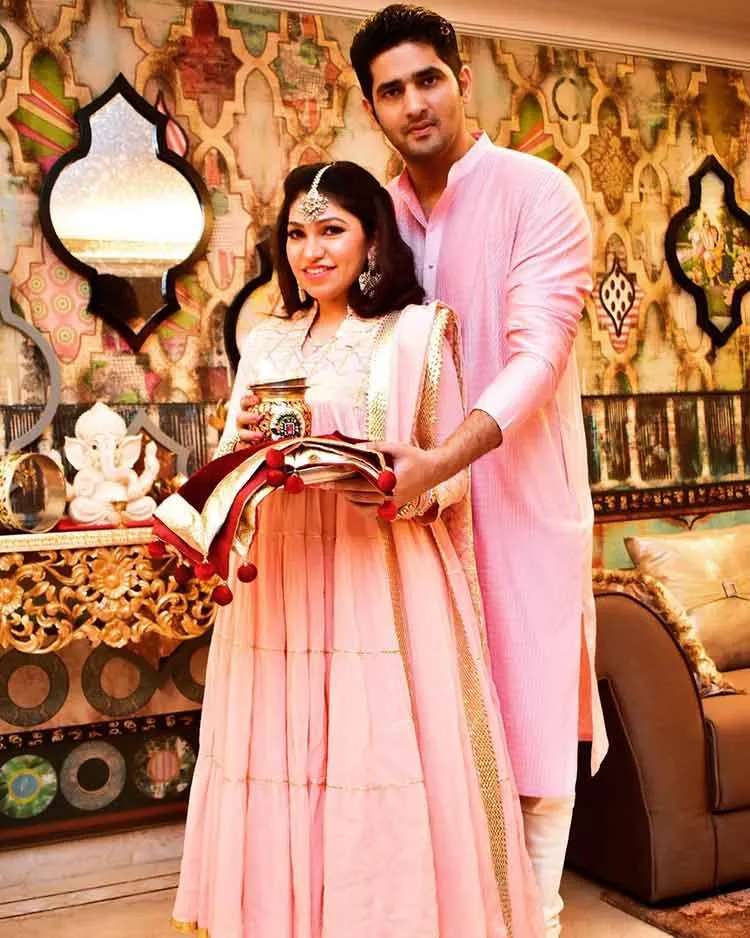 Tulsi Kumar with her husband Hitesh Relhan in matching pink traditional outfit Tulsi Kumar with her husband Hitesh Relhan in matching pink traditional outfit - Indian singer couple