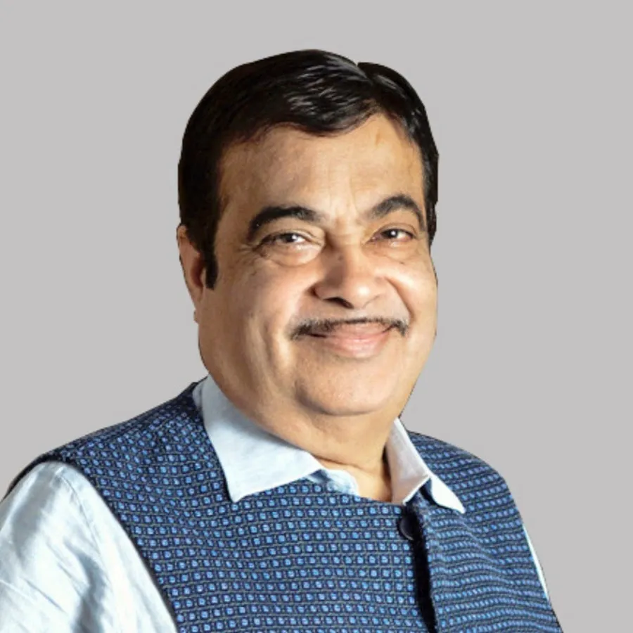 Smiling Nitin Gadkari in white kurta with blue waist coat Smiling Nitin Gadkari in white kurta with blue waist coat - indian celebrities with diabetes